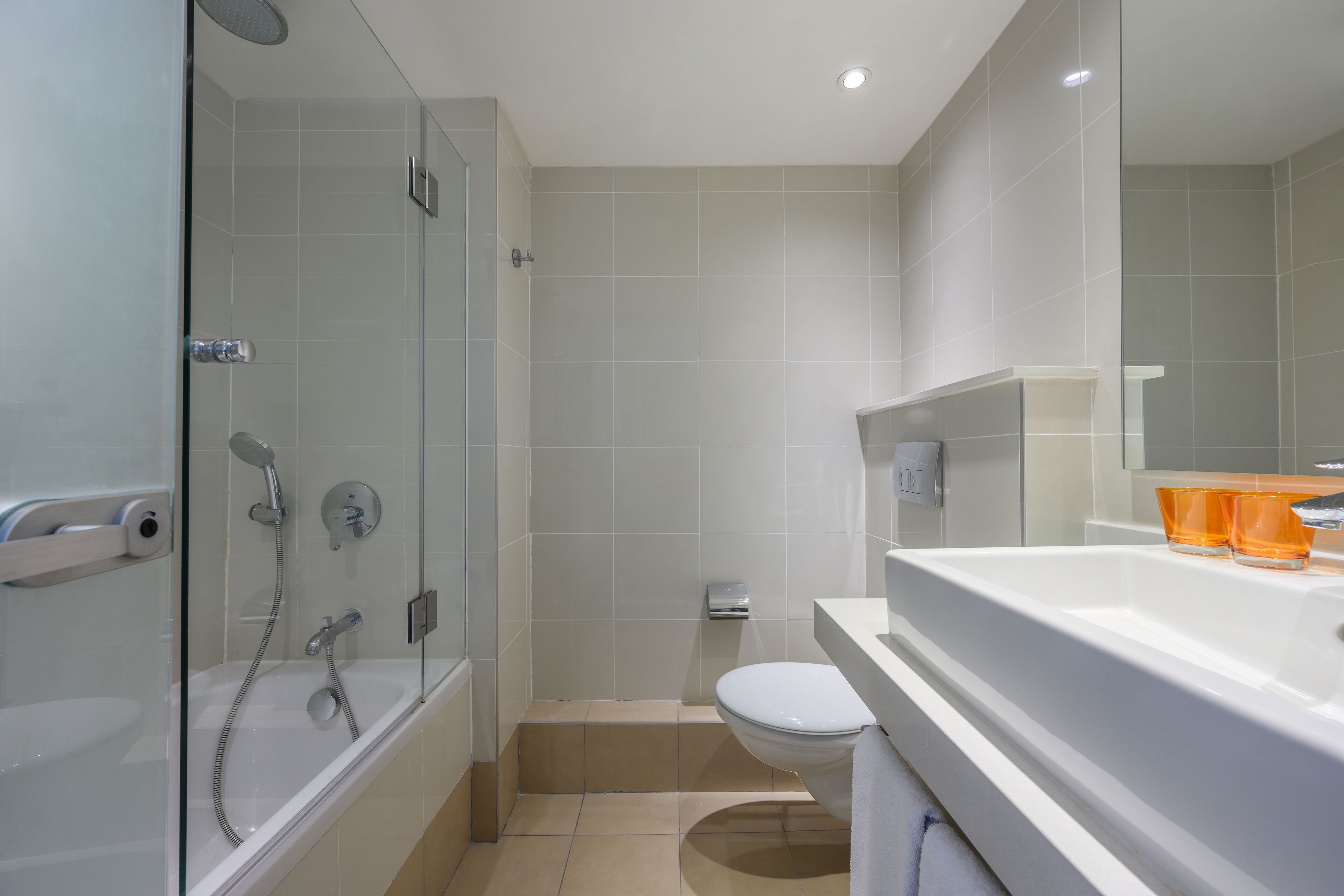 bathtub, free toiletries, hair dryer, towels