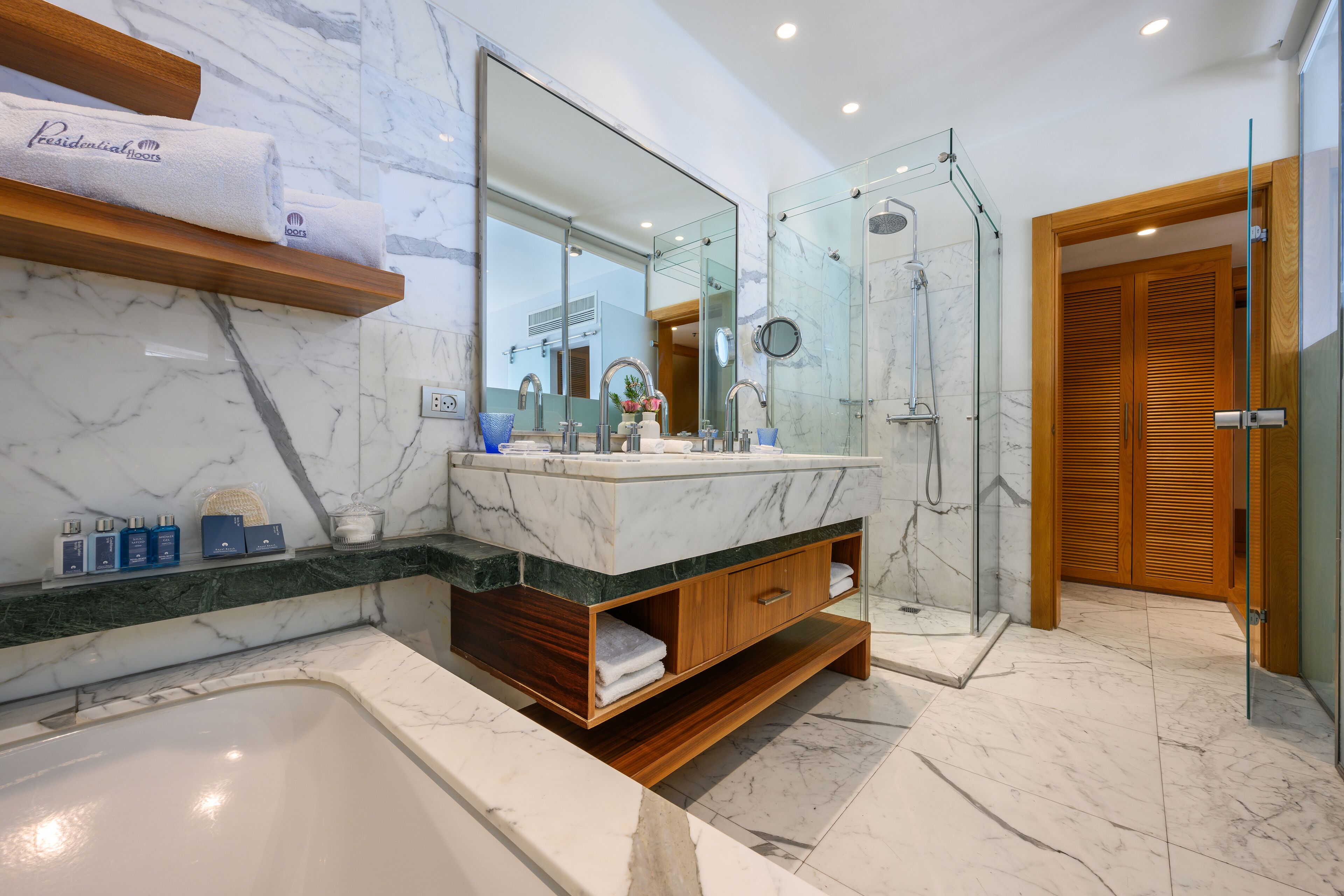 junior suite | bathroom | designer toiletries, hair dryer, bathrobes, slippers