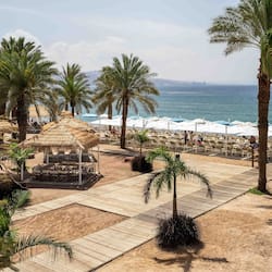 On the beach, sun-loungers, beach umbrellas, beach towels