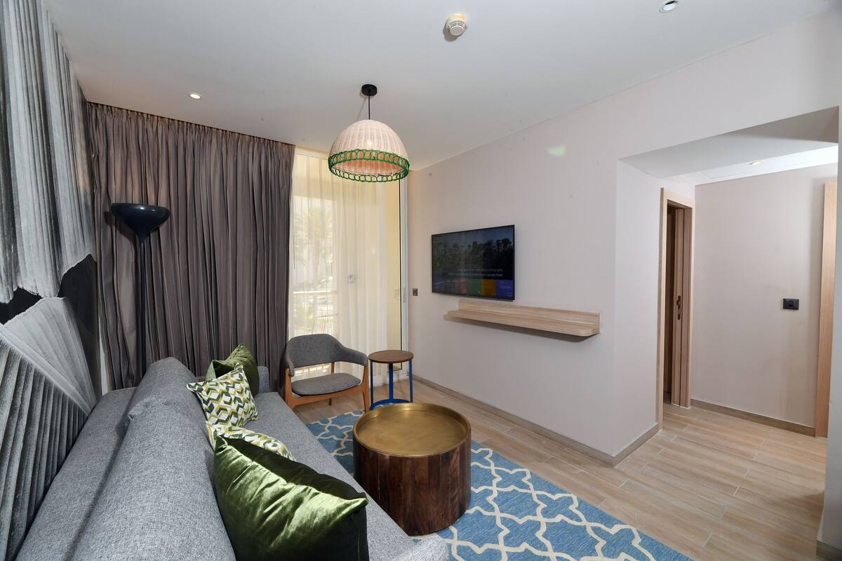 New Large Family Suite | Living room | TV