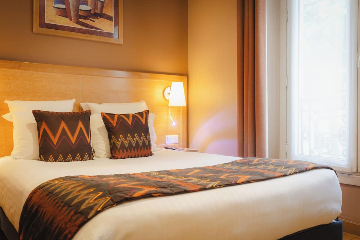 Habitación doble superior | Minibar, caja de seguridad en la habitación y decoración personalizada