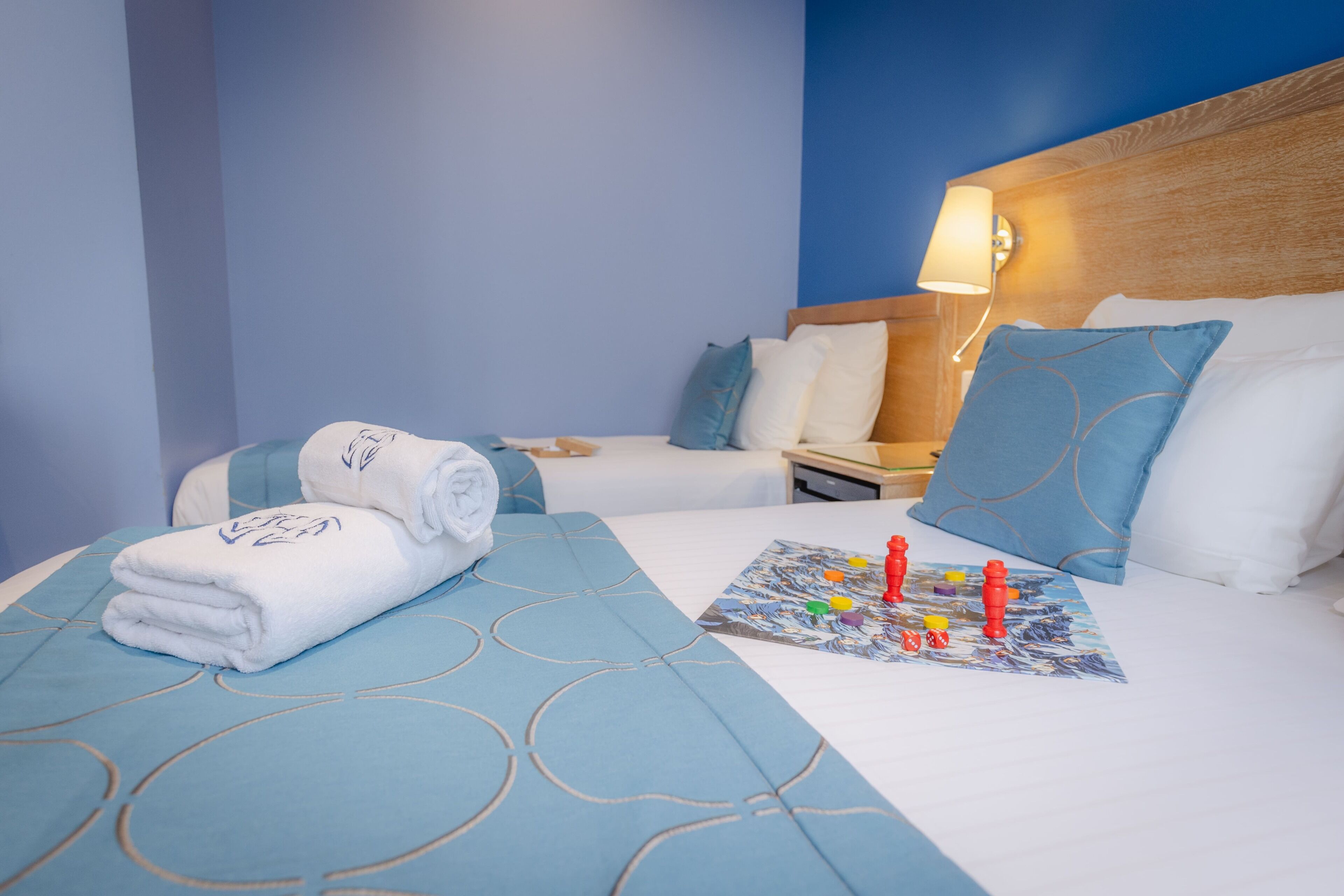 triple room | minibar, in-room safe, individually decorated, individually furnished