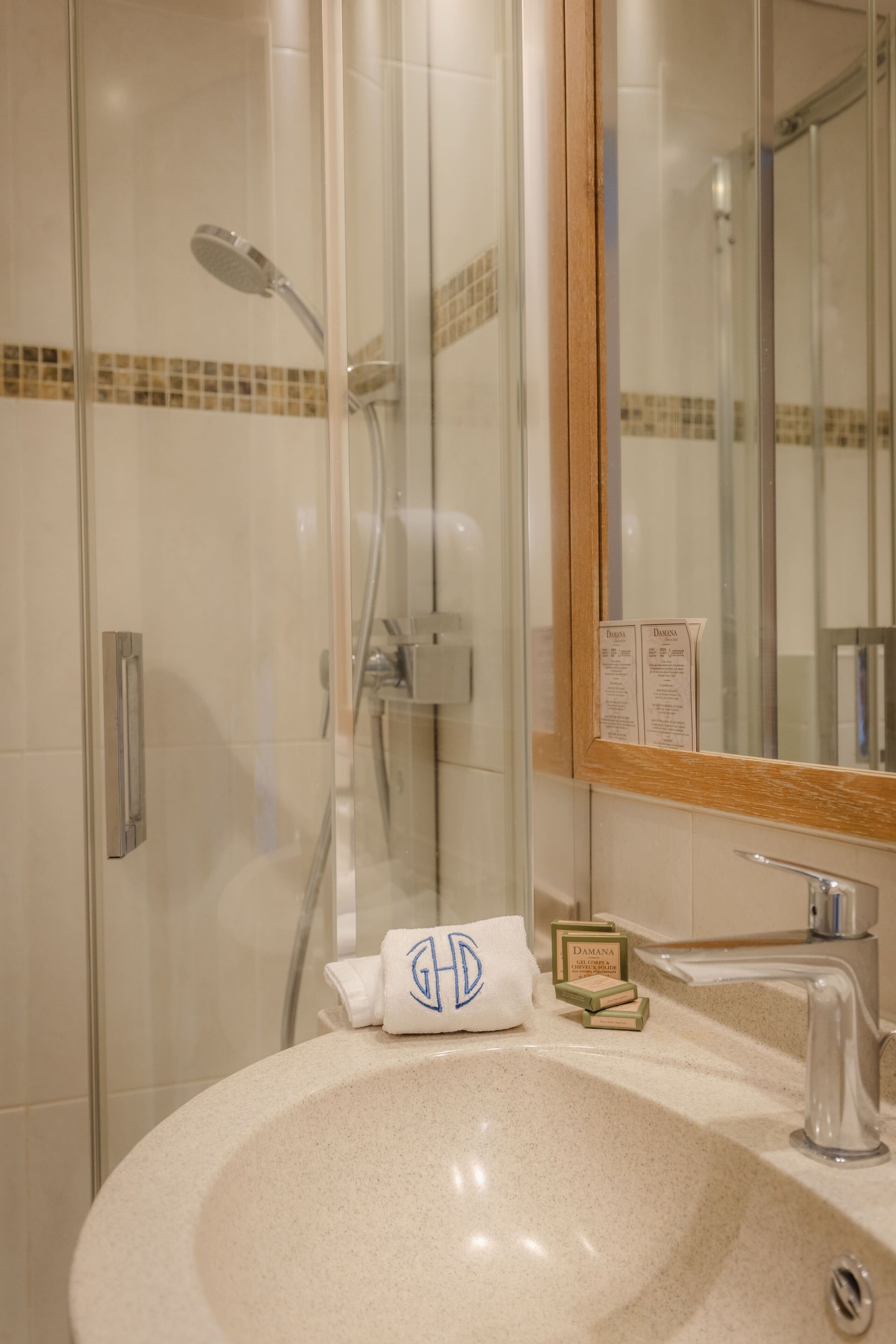 hydromassage showerhead, free toiletries, hair dryer, towels