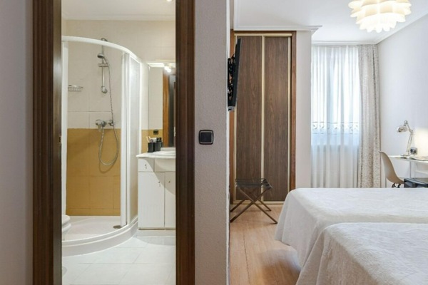 Standard Double Room | Bathroom | Shower, hair dryer, towels, soap