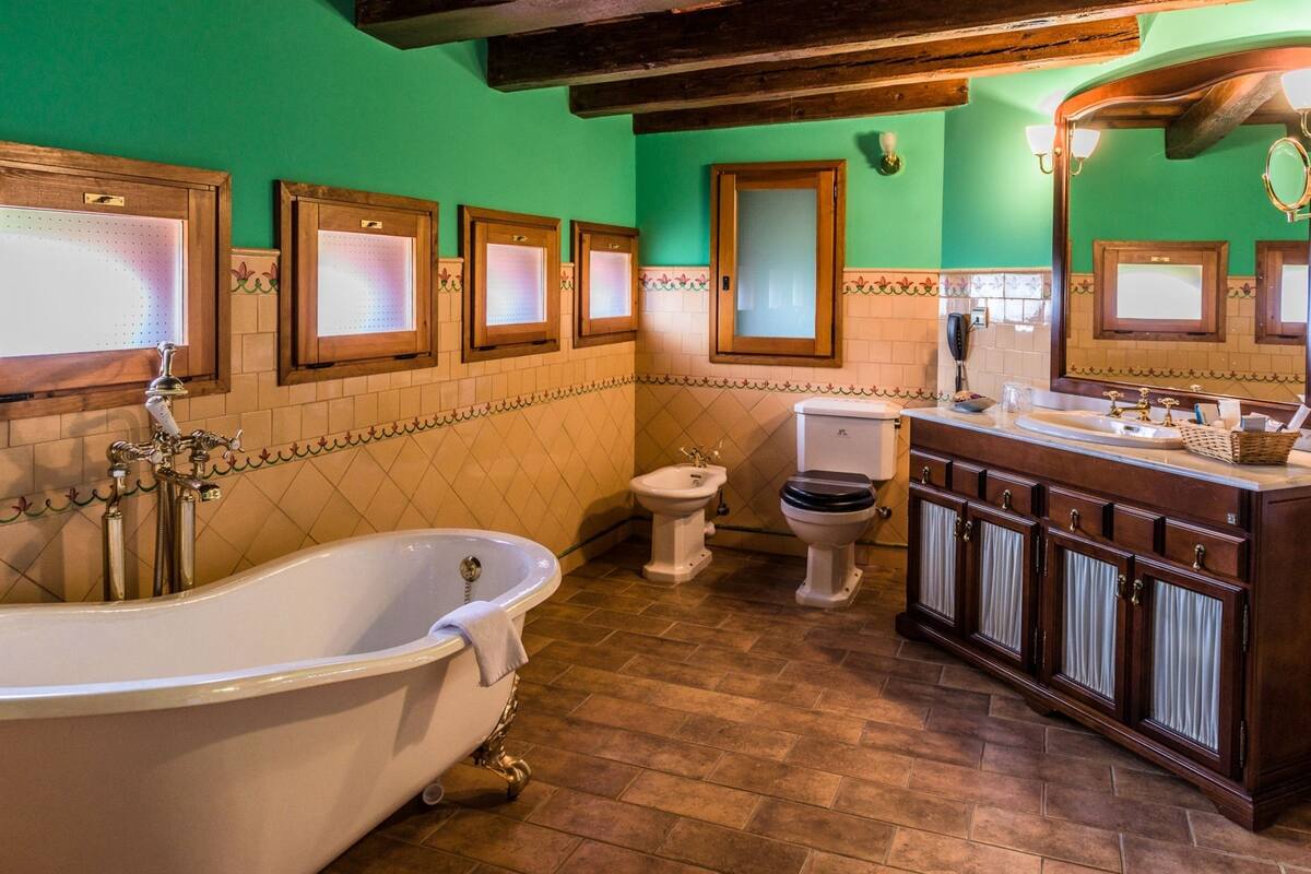 separate bathtub and shower, free toiletries, hair dryer, bathrobes