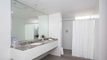 Shower, eco-friendly toiletries, hair dryer, towels
