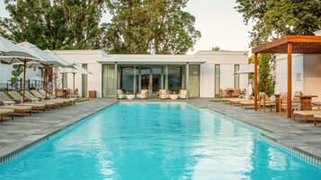 2 outdoor pools, pool umbrellas, pool loungers