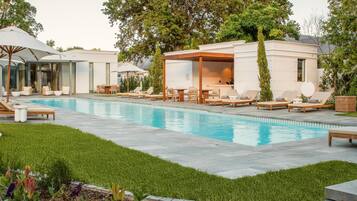 2 outdoor pools, pool umbrellas, pool loungers