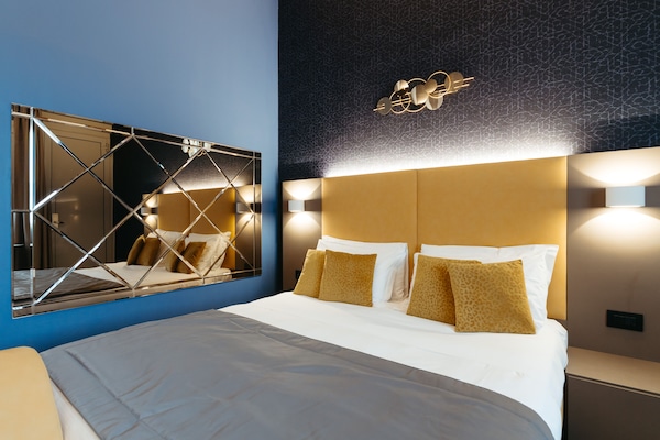 Down duvets, minibar, in-room safe, desk