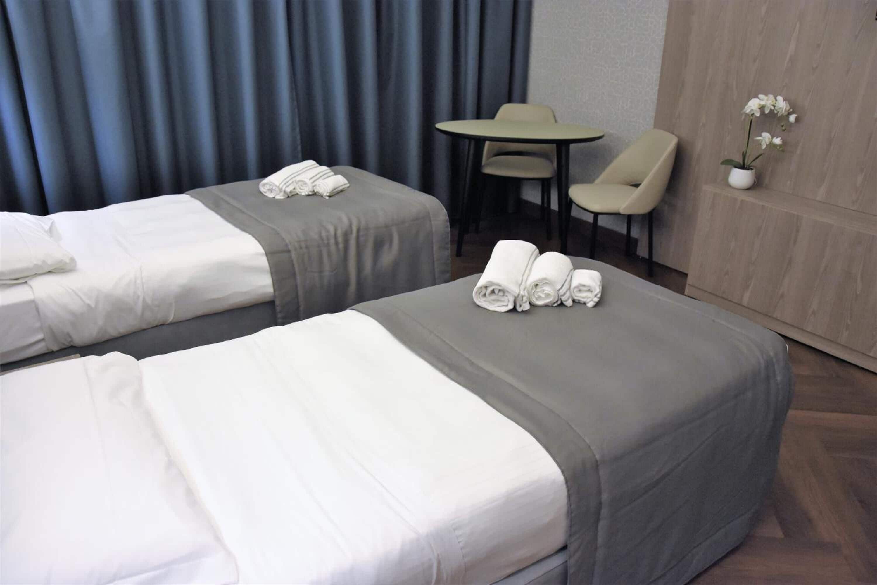 twin room | down duvets, minibar, in-room safe, desk