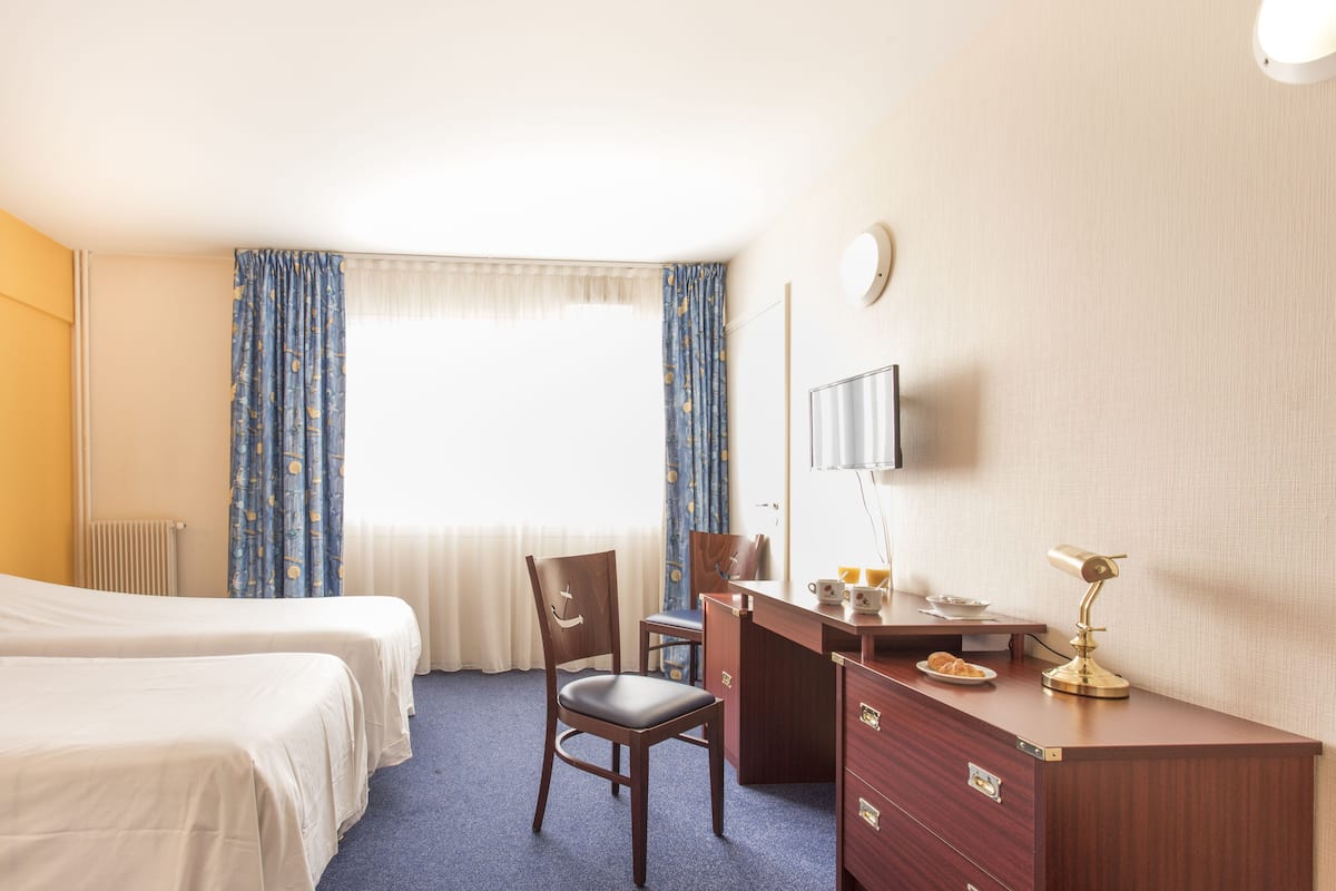 Chambre Classique, 2 lits une place | Bureau, chambres insonorisées, fer et planche à repasser, Wi-Fi gratuit