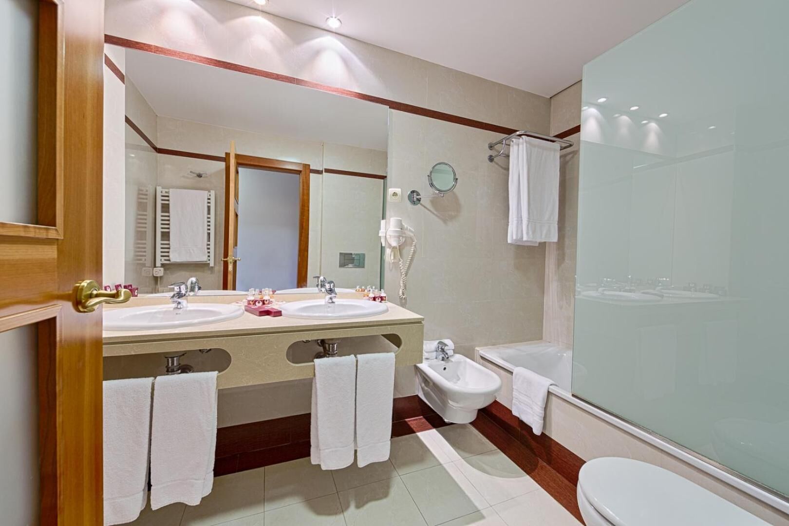 free toiletries, hair dryer, bathrobes, slippers