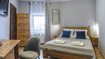 Kahden hengen standard-huone (yksi tai kaksi sänkyä) (Shower ) | Työpöytä, silitysrauta/-lauta, ilmainen Wi-Fi, vuodevaatteet