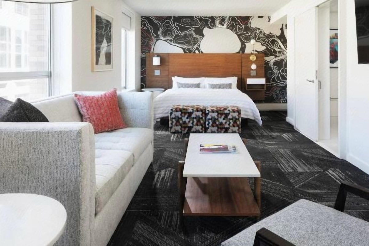 Premium bedding, down comforters, pillowtop beds, minibar