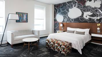 Premium bedding, down comforters, pillowtop beds, minibar