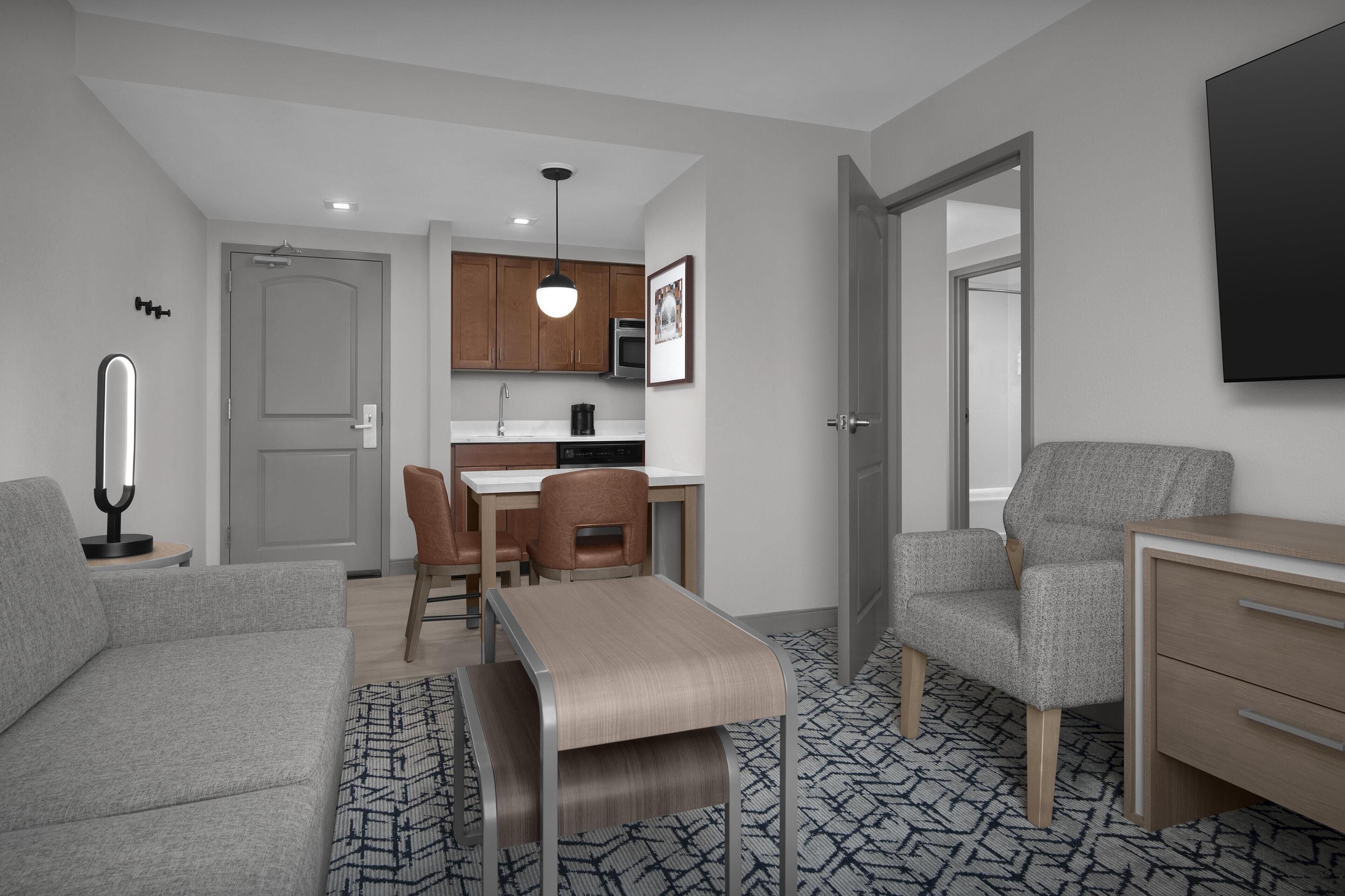 full-sized fridge, microwave, stovetop, dishwasher