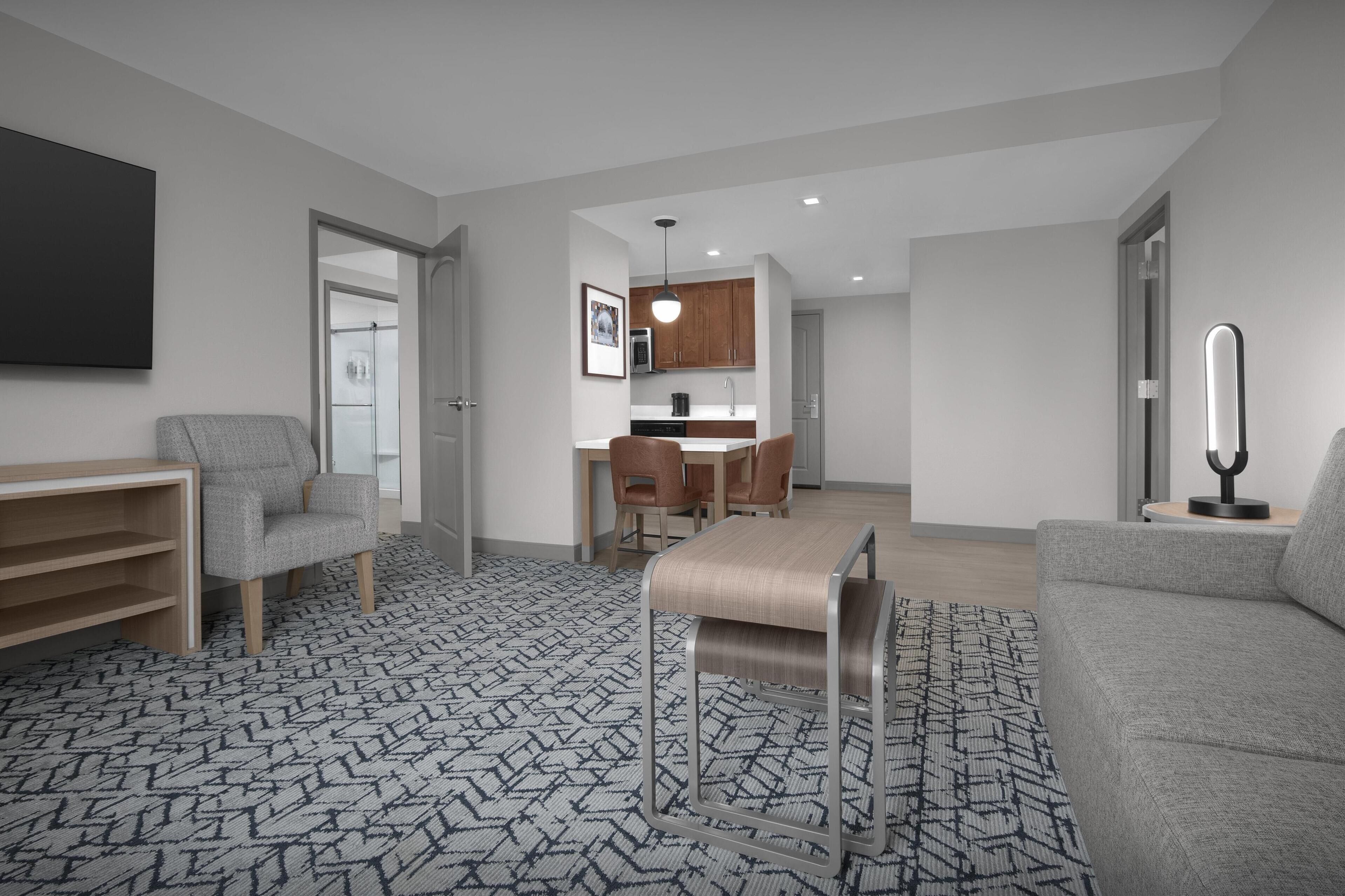 full-sized fridge, microwave, stovetop, dishwasher