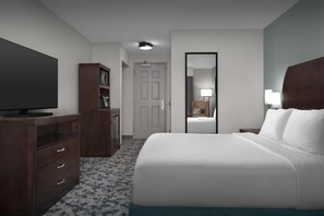 Premium bedding, desk, laptop workspace, blackout curtains