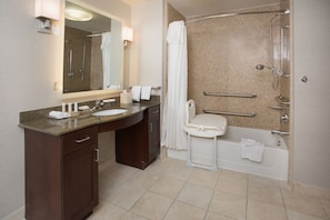 A modern bathroom with a double sink vanity, a walk-in shower, and a bathtub. - Homewood Suites Phoenix Avondale (Avondale)