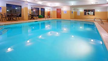Indoor pool, open 9:00 AM to 10:00 PM, pool loungers
