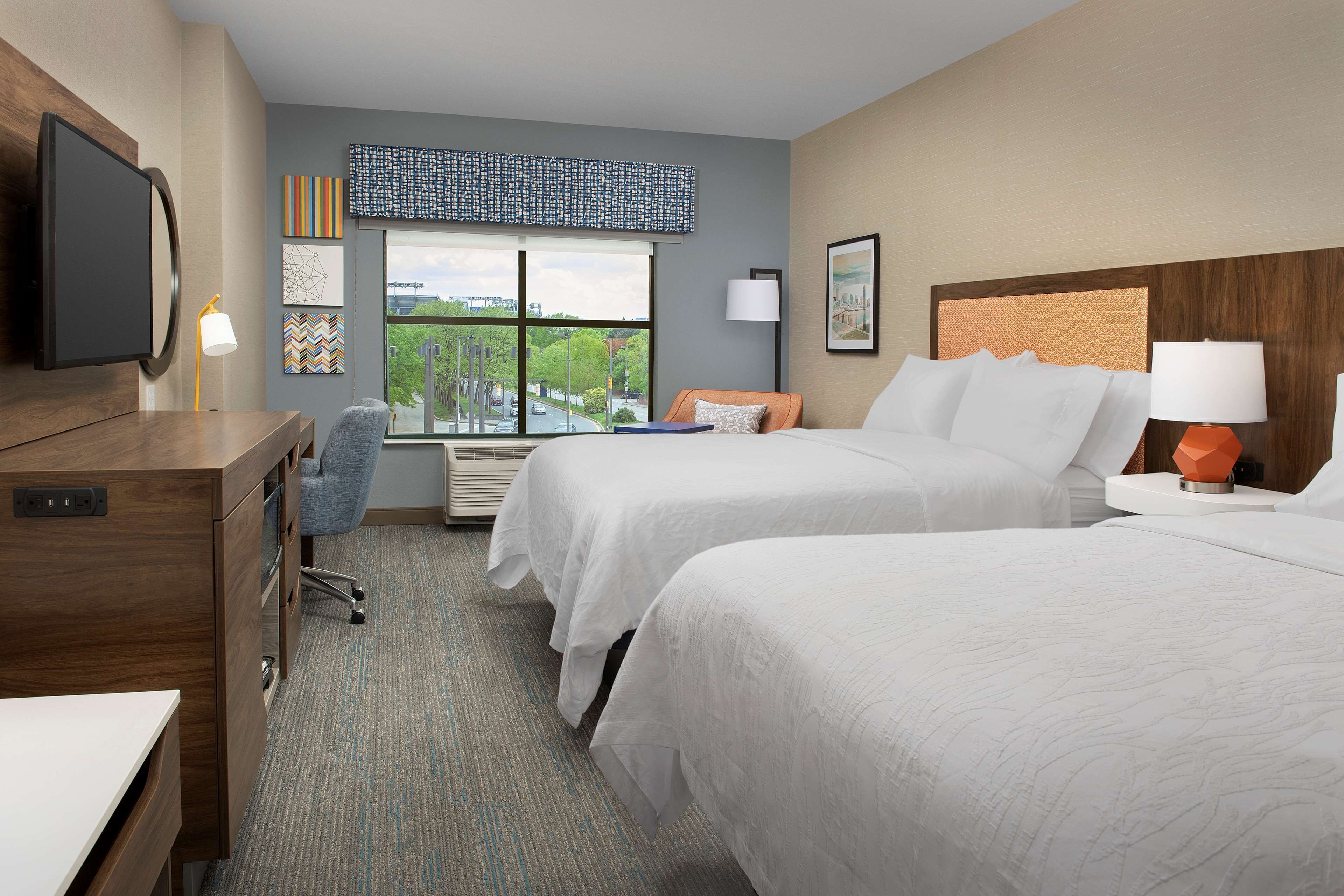 standard room with two queen beds | desk, laptop workspace, blackout curtains, iron/ironing board