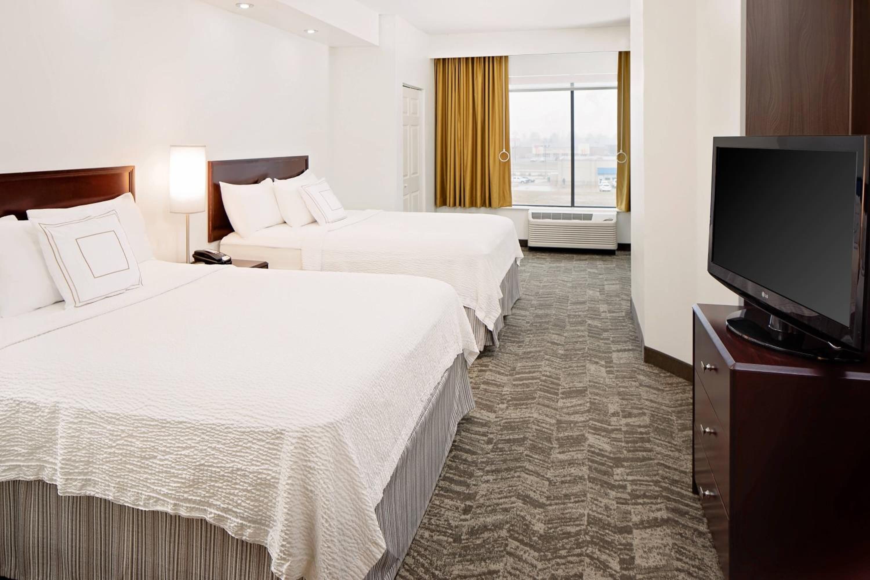 Premium bedding, down comforters, pillowtop beds, desk