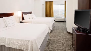Premium bedding, down comforters, pillowtop beds, desk