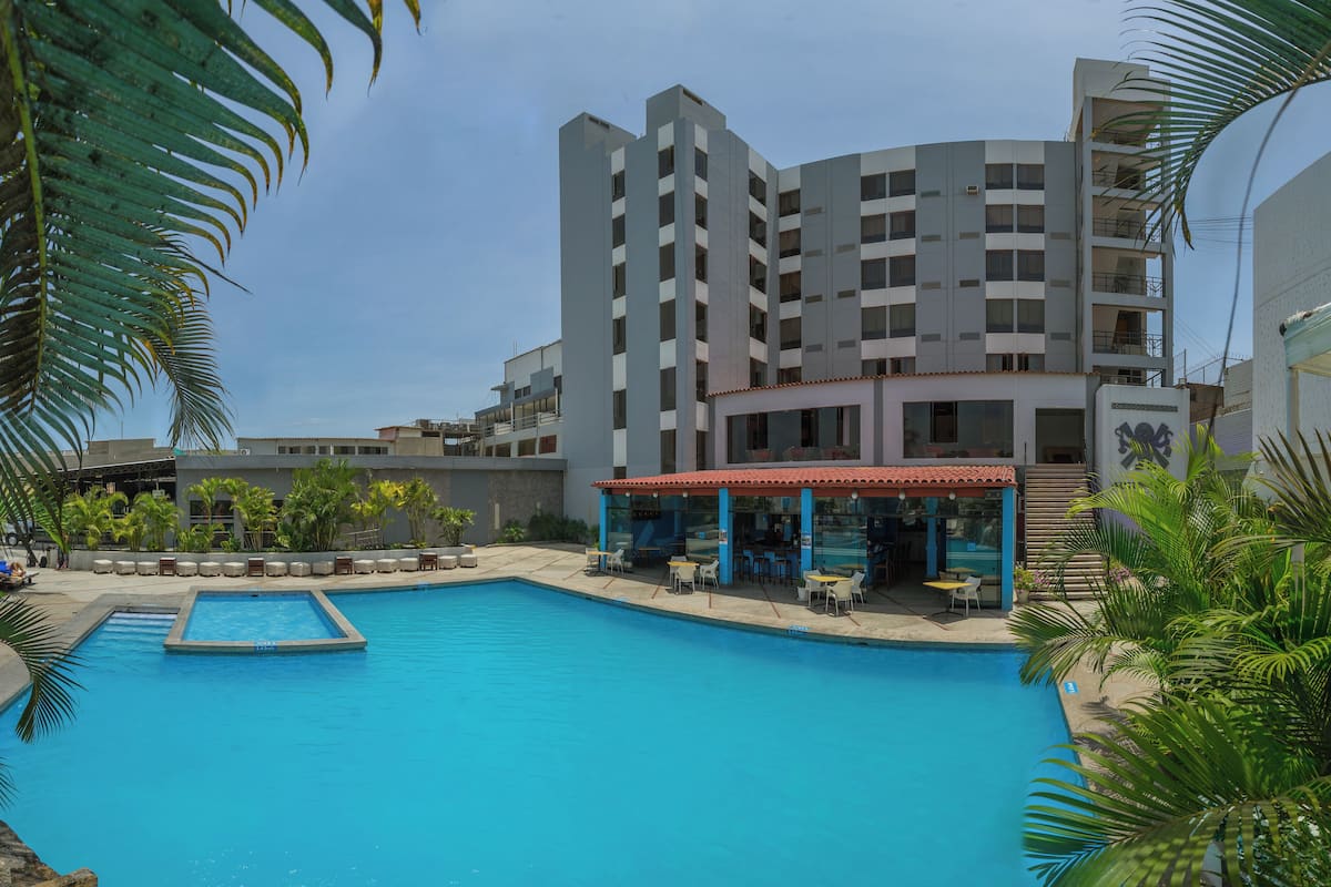 Outdoor pool, open 2:00 PM to 9:00 PM, sun loungers