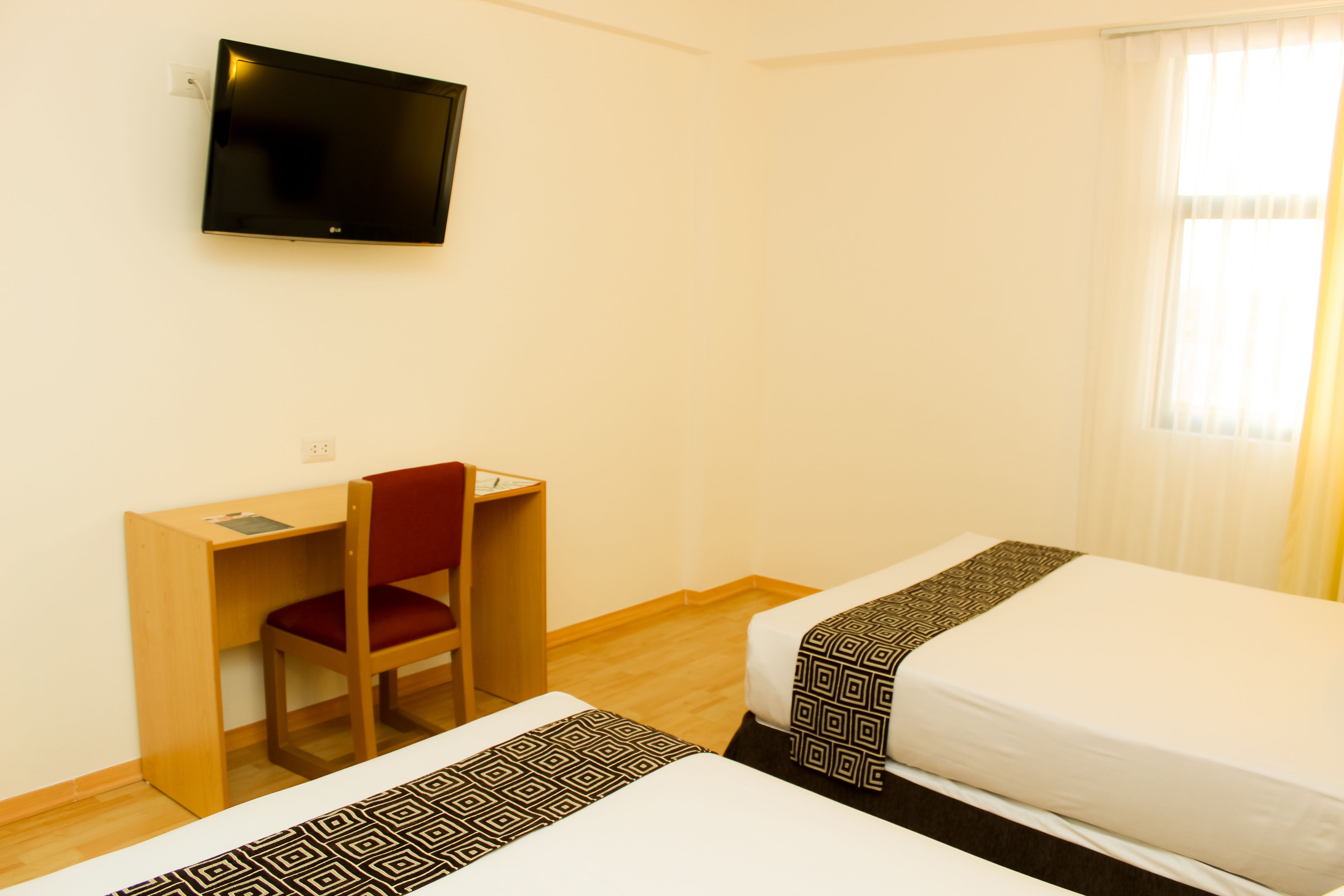 twin room | premium bedding, minibar, in-room safe, desk