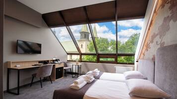 Desk, laptop workspace, blackout curtains, iron/ironing board