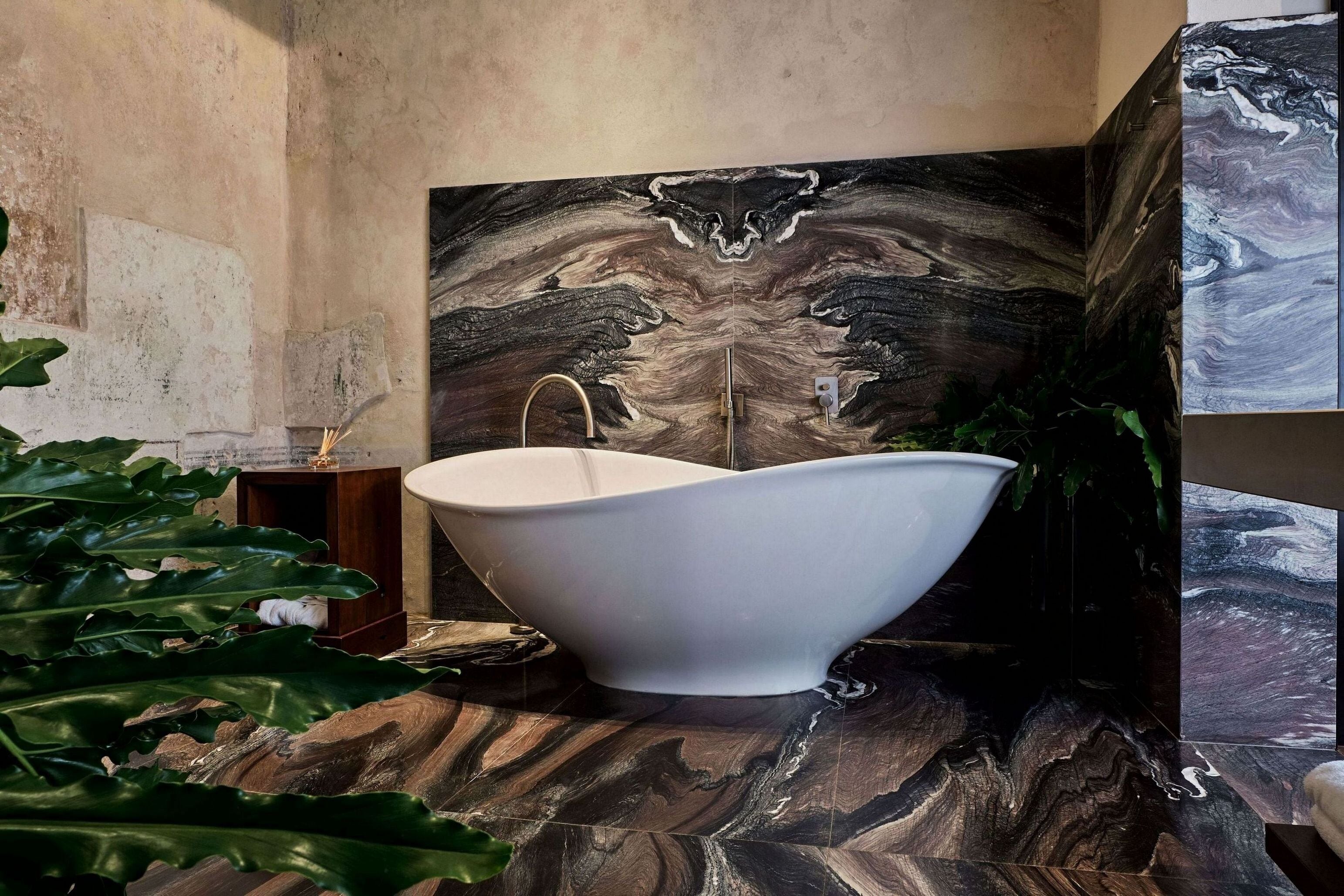 luxury suite | bathroom | designer toiletries, hair dryer, bathrobes, slippers