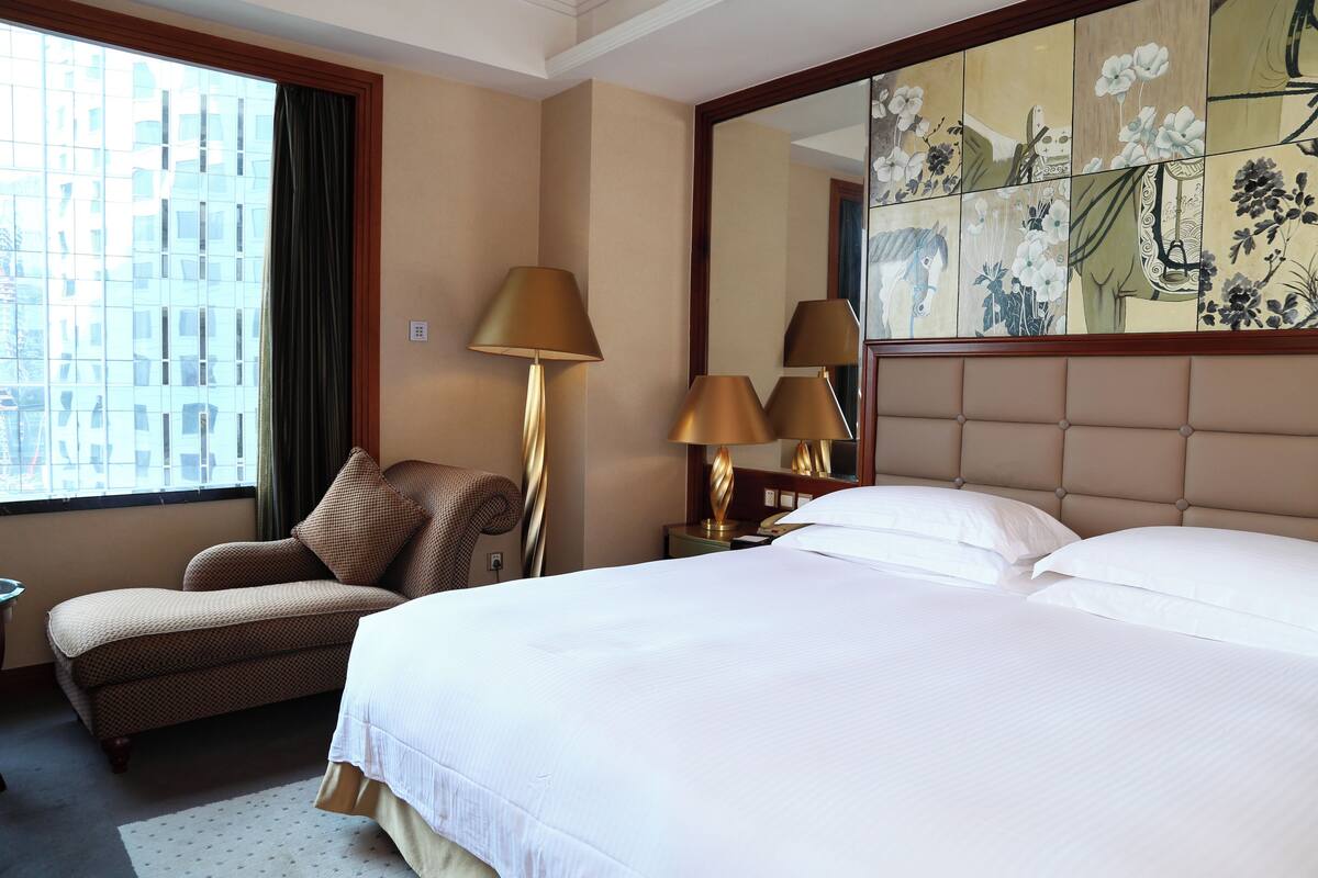 Suite, 1 King Bed, City View | Premium bedding, down comforters, minibar, in-room safe