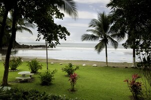 On the beach, sun loungers, beach umbrellas, beach towels