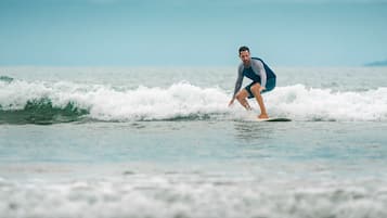 A person surfing on a wave.