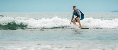 A person surfing on a wave.