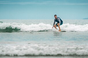 A person surfing on a wave.