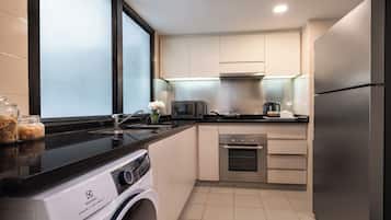 Executive Room, 3 Bedrooms | Private kitchen | Full-size fridge, microwave, oven, coffee/tea maker
