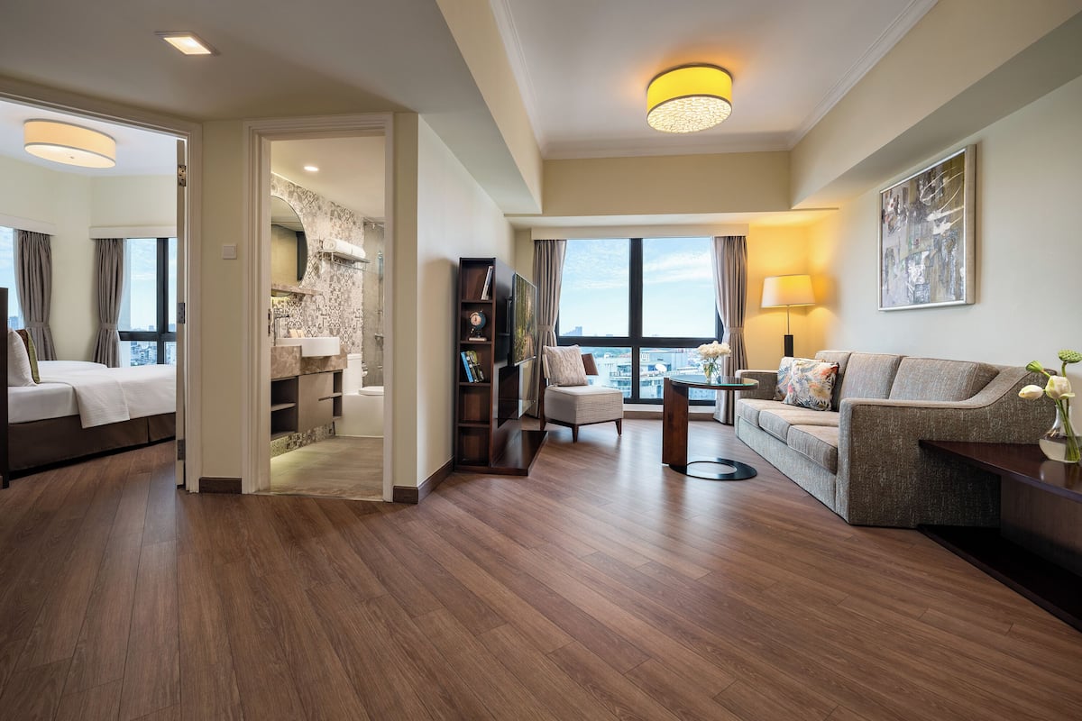 Executive Room, 2 Bedrooms | Living area | LCD TV, DVD player