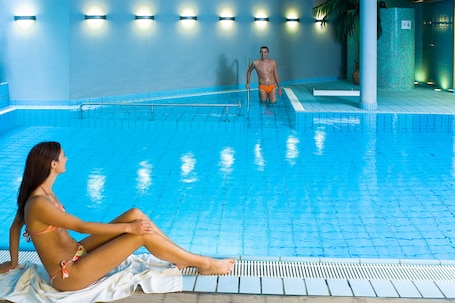 Indoor pool, open 7:00 AM to 11:00 PM, sun loungers
