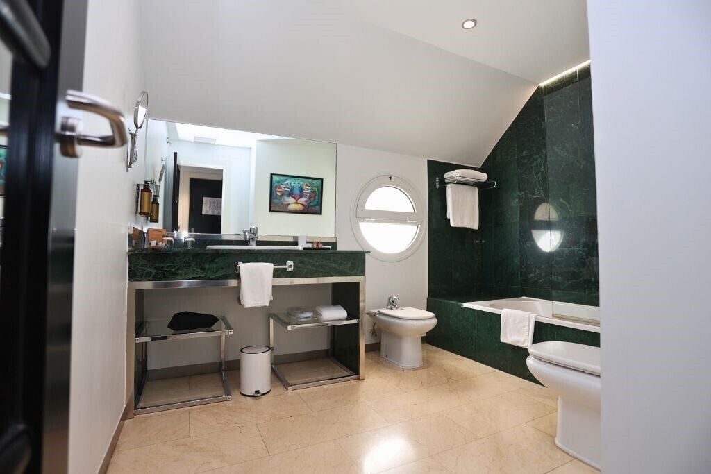 free toiletries, hair dryer, bidet, towels