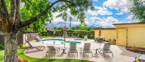 Outdoor pool, open 8 AM to 10 PM, pool umbrellas, sun loungers