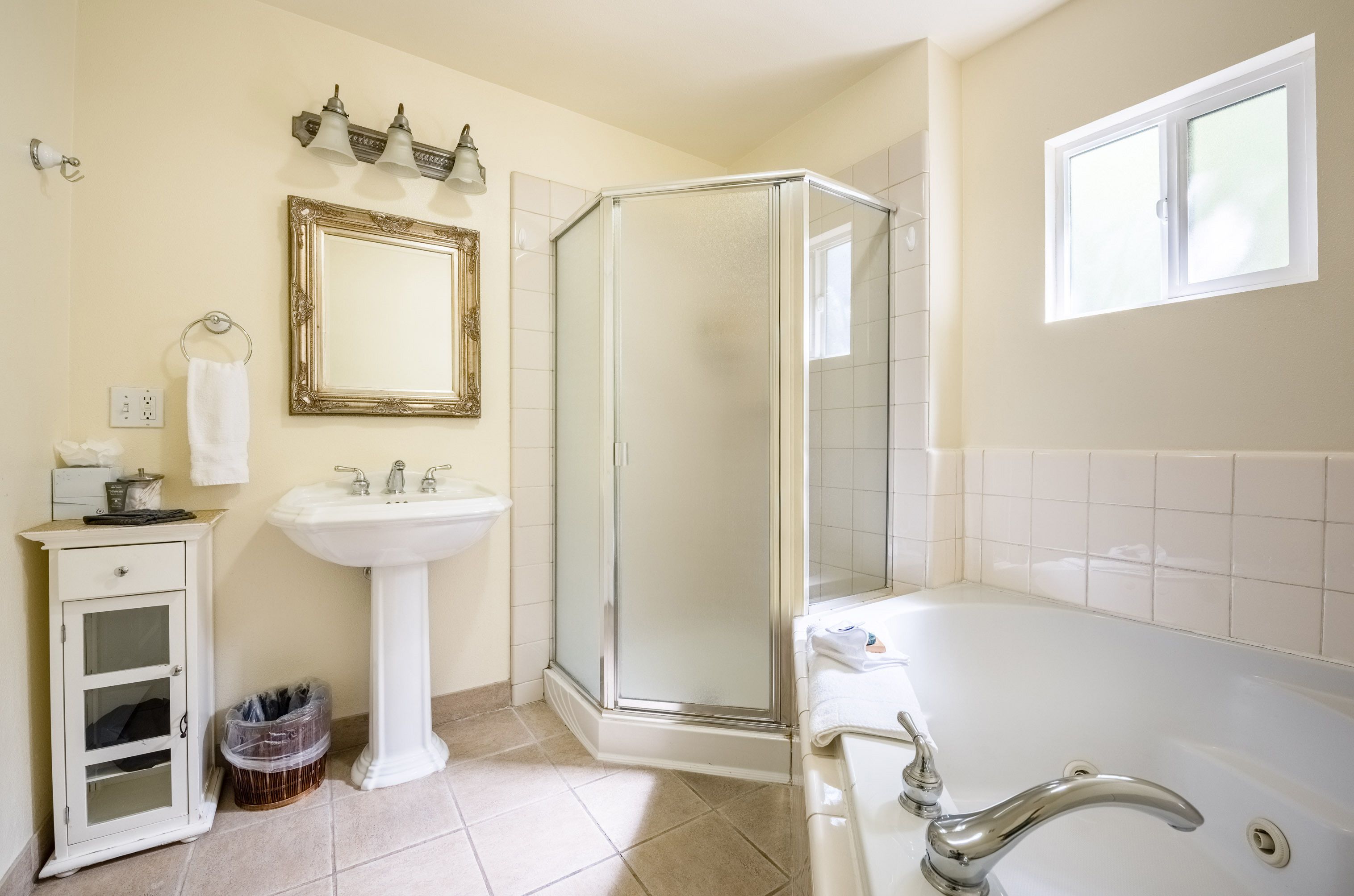 designer toiletries, hair dryer, bathrobes, towels