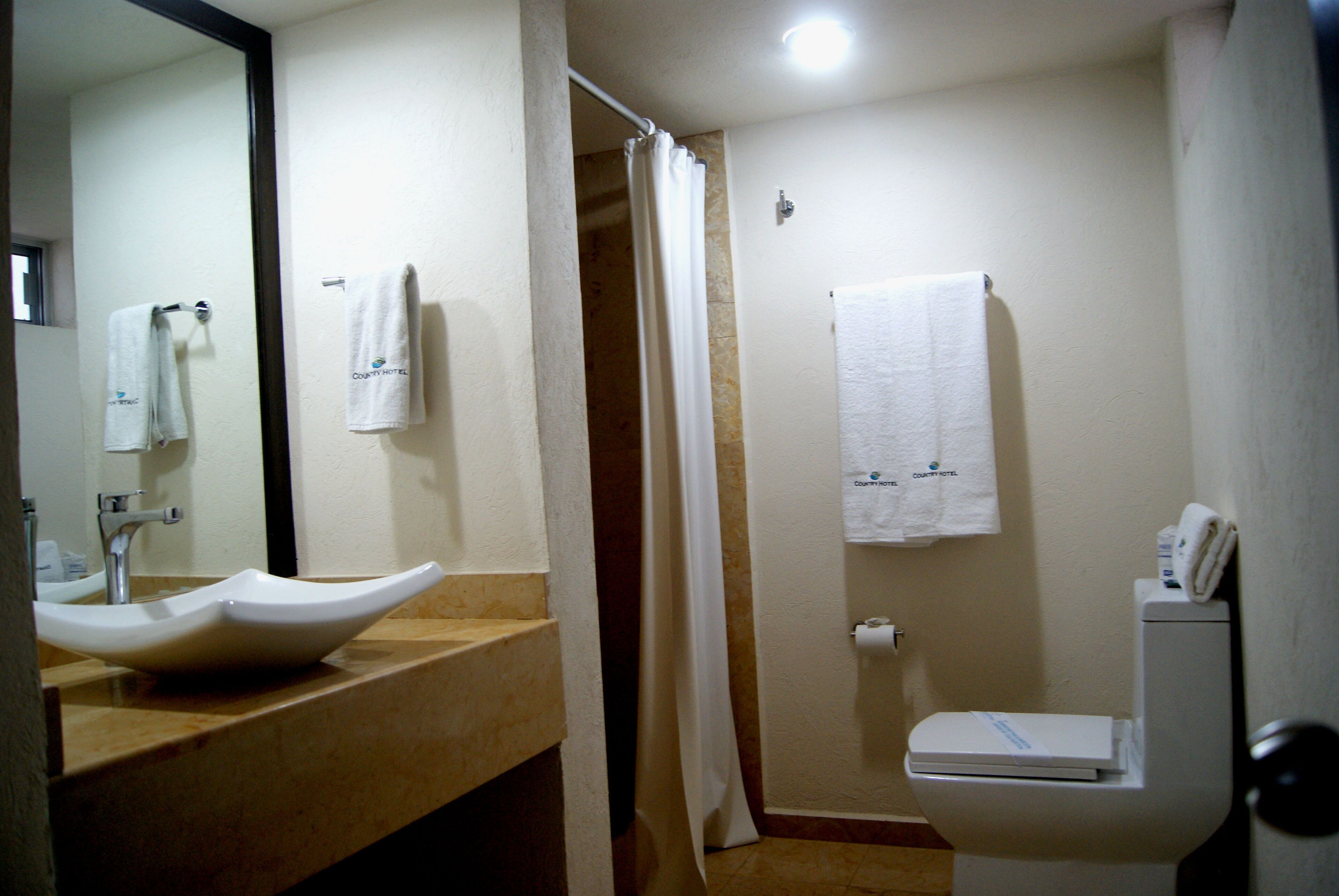 Foto - Country Hotel & Suites