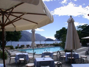 Seasonal outdoor pool, open 8:00 AM to 7 PM, pool umbrellas