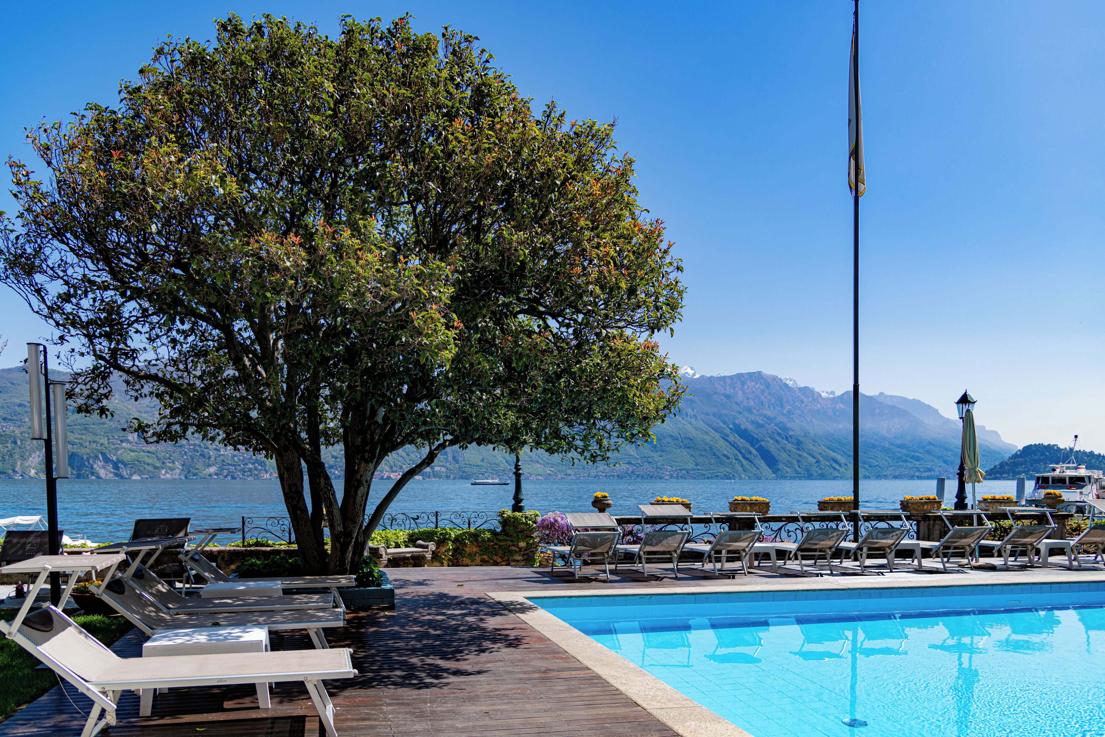 Seasonal outdoor pool, open 8:00 AM to 7 PM, pool umbrellas