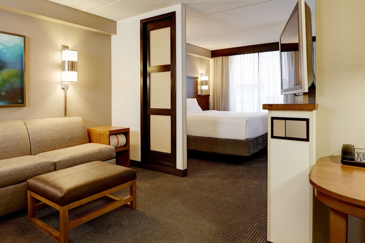 premium bedding, desk, laptop workspace, blackout curtains
