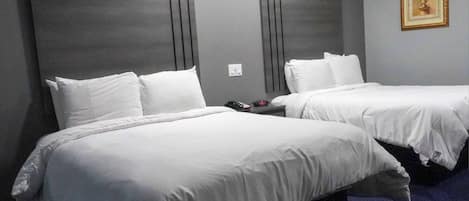 Suite, 2 Queen Beds, Non Smoking | Individually decorated, individually furnished, desk, soundproofing