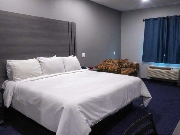 Suite, 1 King Bed, Non Smoking | Individually decorated, individually furnished, desk, soundproofing