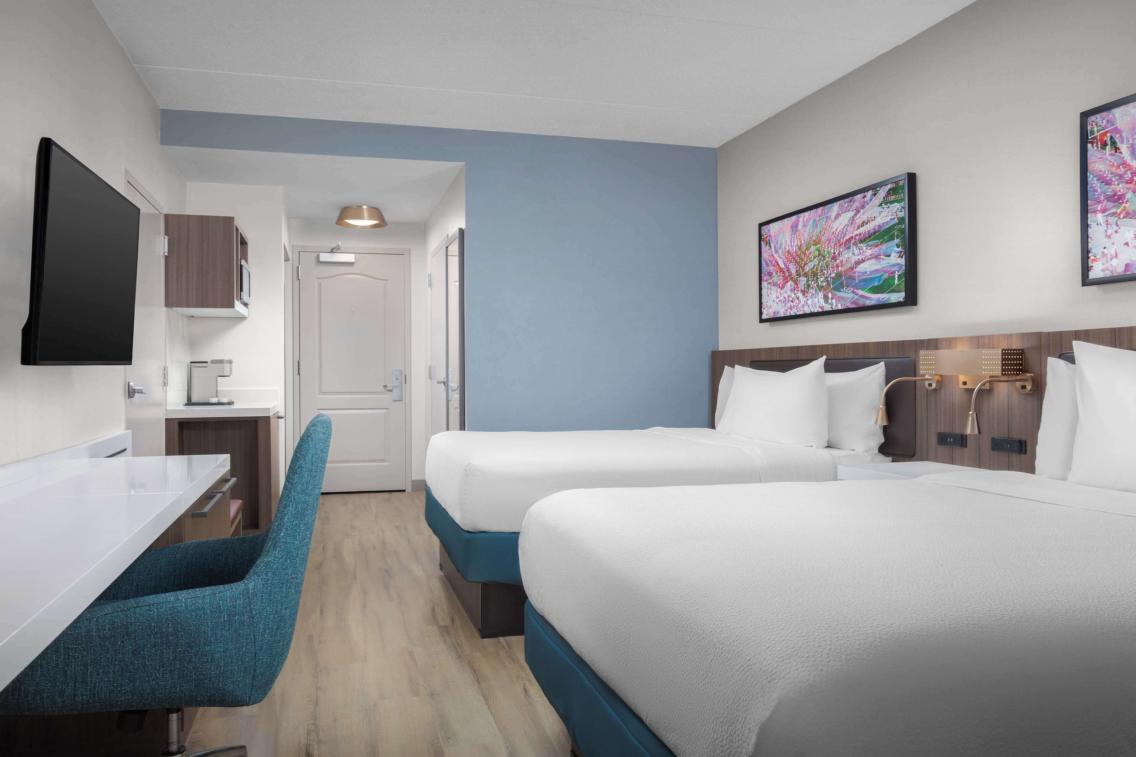 room, 2 queen beds | in-room safe, desk, laptop workspace, blackout curtains