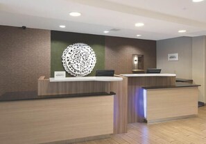 Reception area with two desks and a welcoming atmosphere.